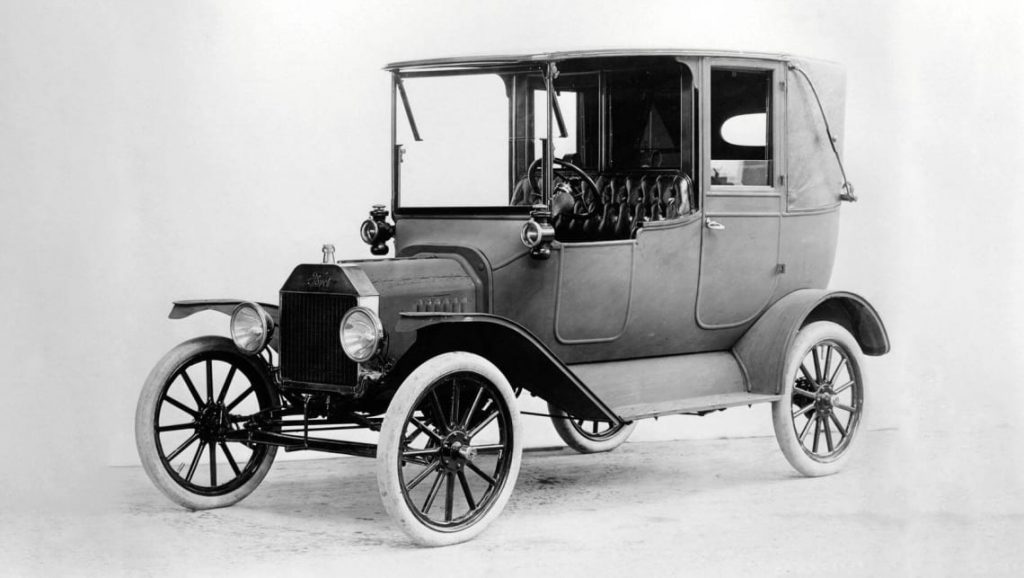 Henry Ford generally gets the credit for the first assembly line and the production of cars en masse, with the Model T, in 1908.