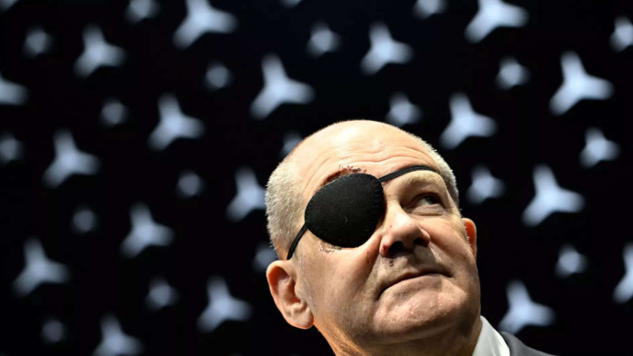Here’s why German Chancellor Olaf Scholz wore an eyepatch