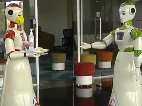 Robots distributing sanitizers in kerala